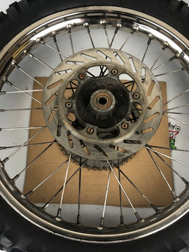 hintere Speichenfelge mit Stollenreifen, Aprilia -06 (RX,MX), 110/80-18, 15mm Achsdurchmesser