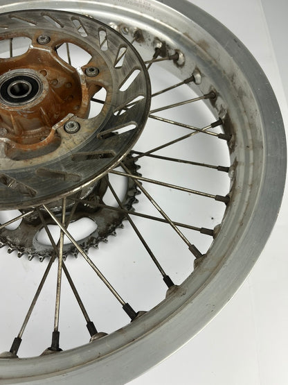 hintere Speichenfelge mit Stollenreifen, Aprilia -06 (RX,MX), 17Z, 15mm Achsdurchmesser