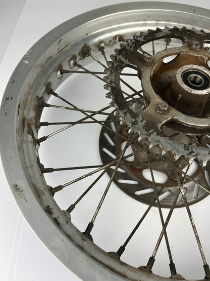 hintere Speichenfelge mit Stollenreifen, Aprilia -06 (RX,MX), 17Z, 15mm Achsdurchmesser
