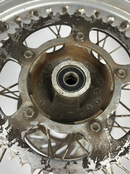 hintere Speichenfelge mit Stollenreifen, Aprilia -06 (RX,MX), 17Z, 15mm Achsdurchmesser