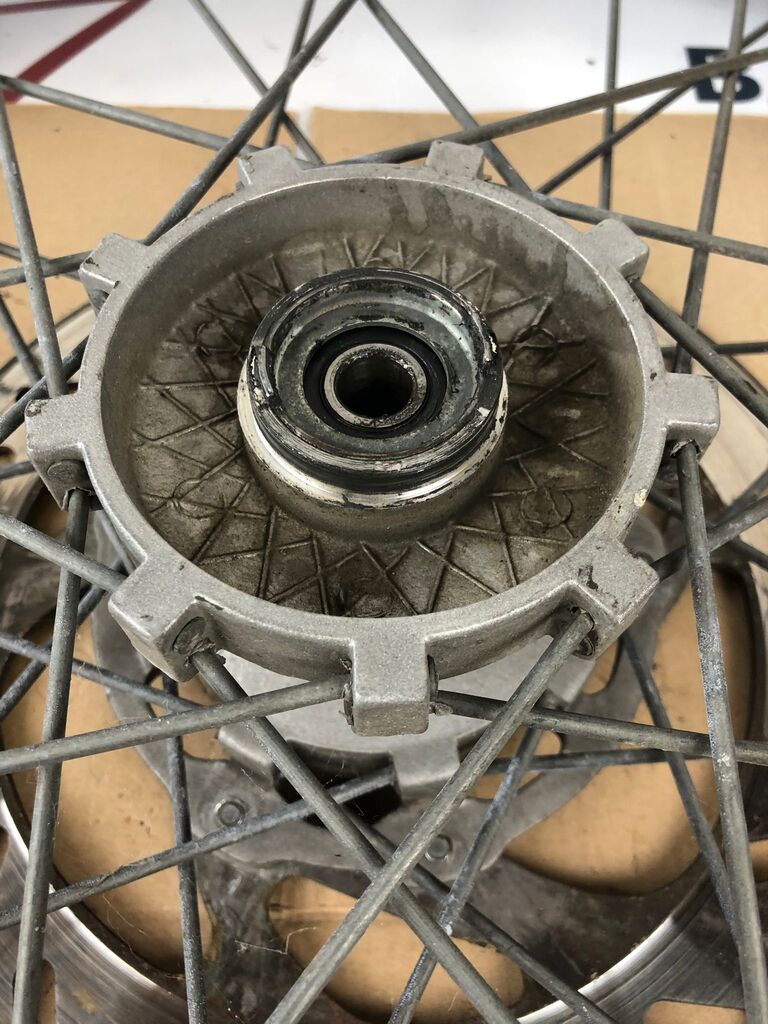 vordere Speichenfelge mit Stollenreifen, Derbi/Aprilia/Gilera, 80/90-21, 12mm Achsdurchmesser