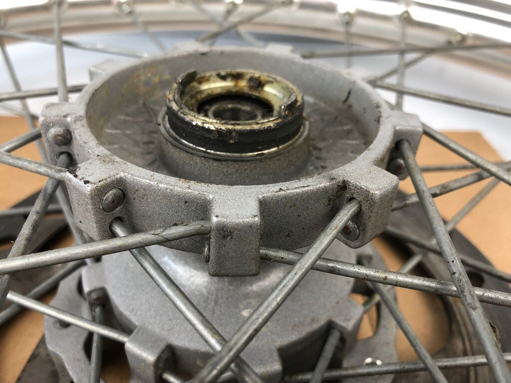vordere Speichenfelge mit Stollenreifen, Derbi/Aprilia/Gilera, 80/90-21, 12mm Achsdurchmesser