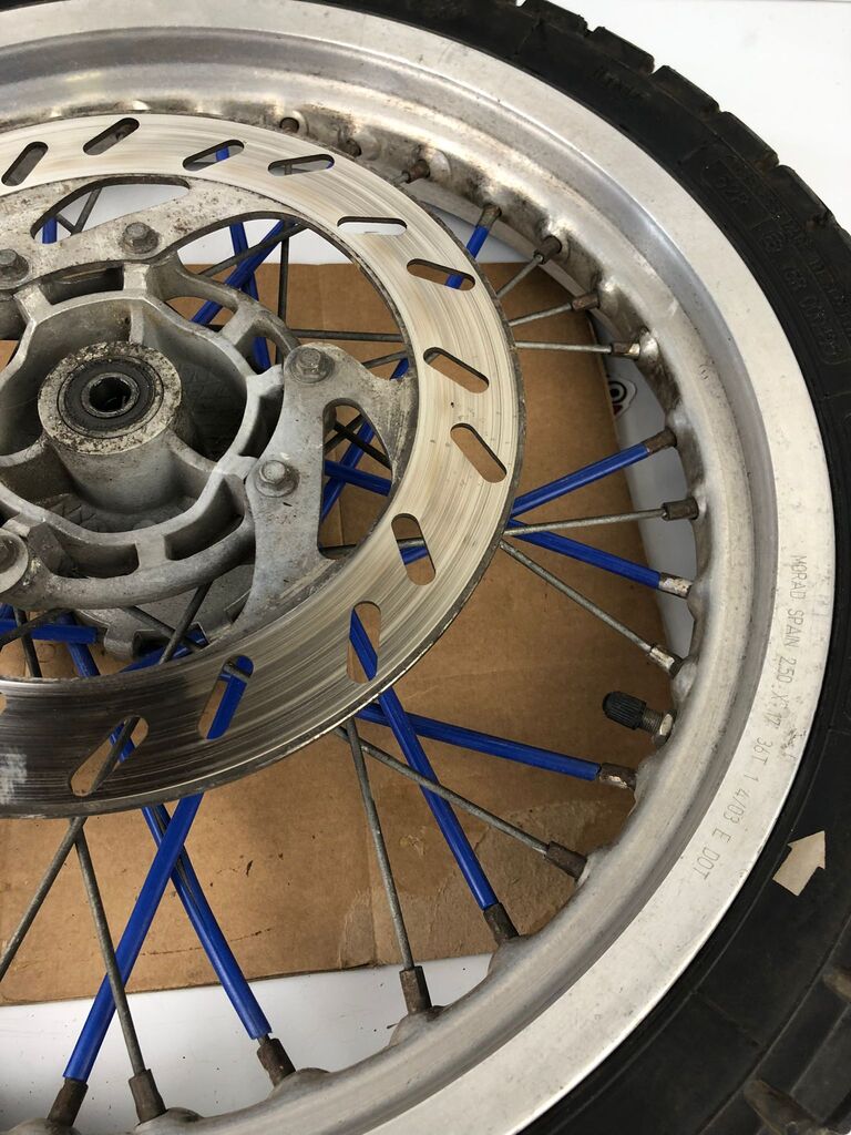 vordere Speichenfelge mit Reifen, Derbi/Aprilia/Gilera, 100/80-17, 12mm Achsdurchmesser