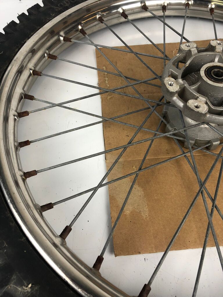 vordere Speichenfelge mit Stollenreifen, Derbi/Aprilia/Gilera, 80/90-21, 12mm Achsdurchmesser
